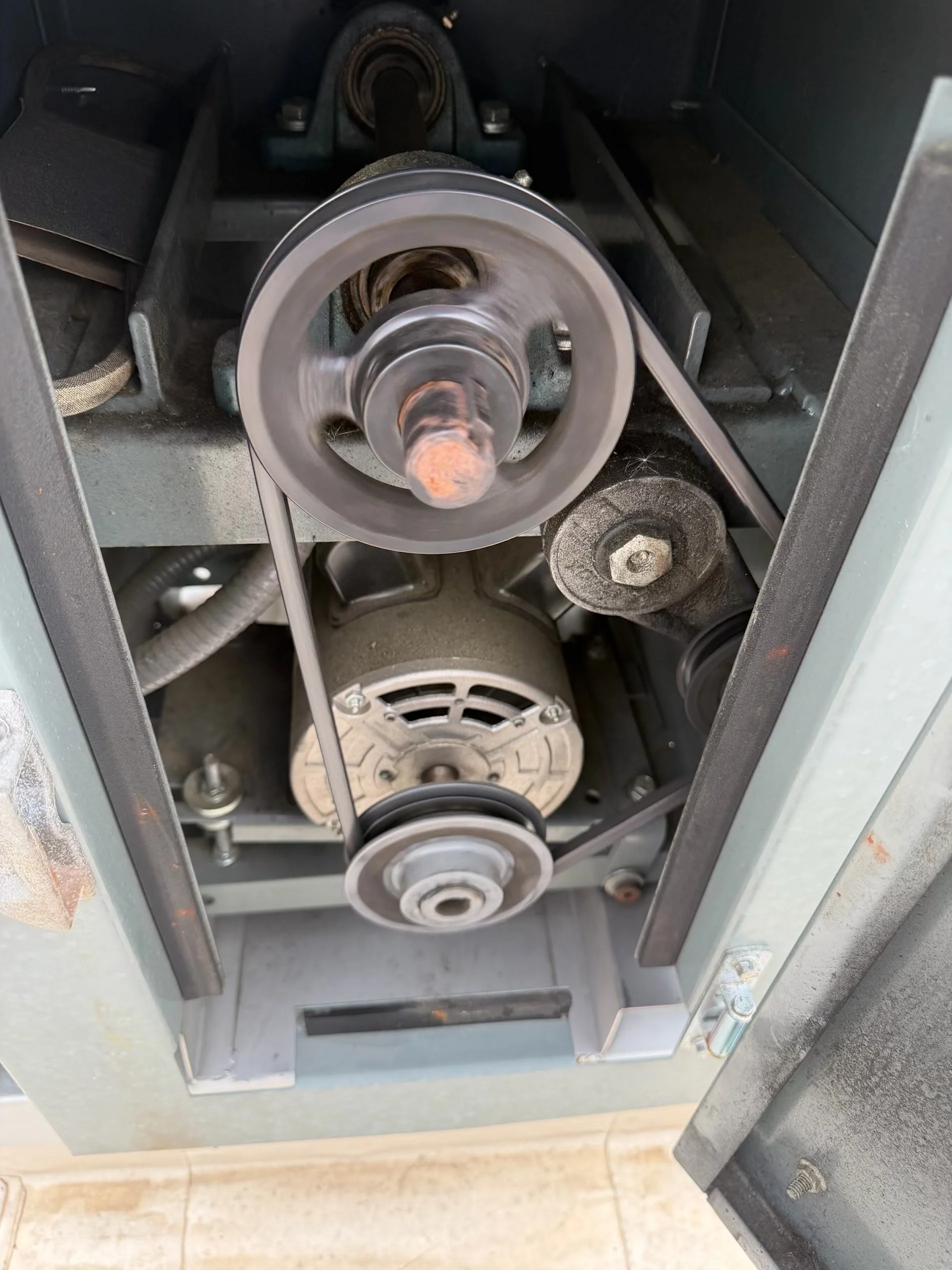 Dryer vent ductwork interior showing blower wheel assembly and metal ducting components